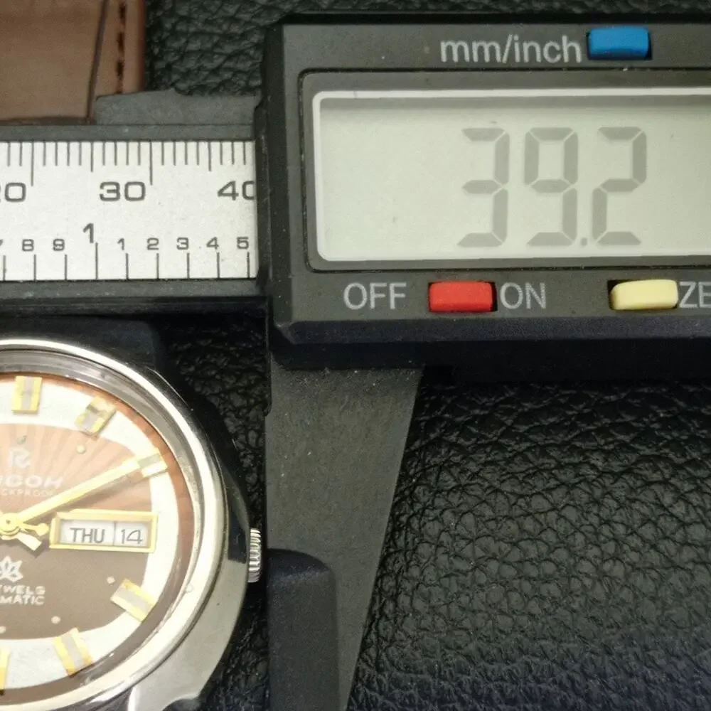 Ricoh this watch